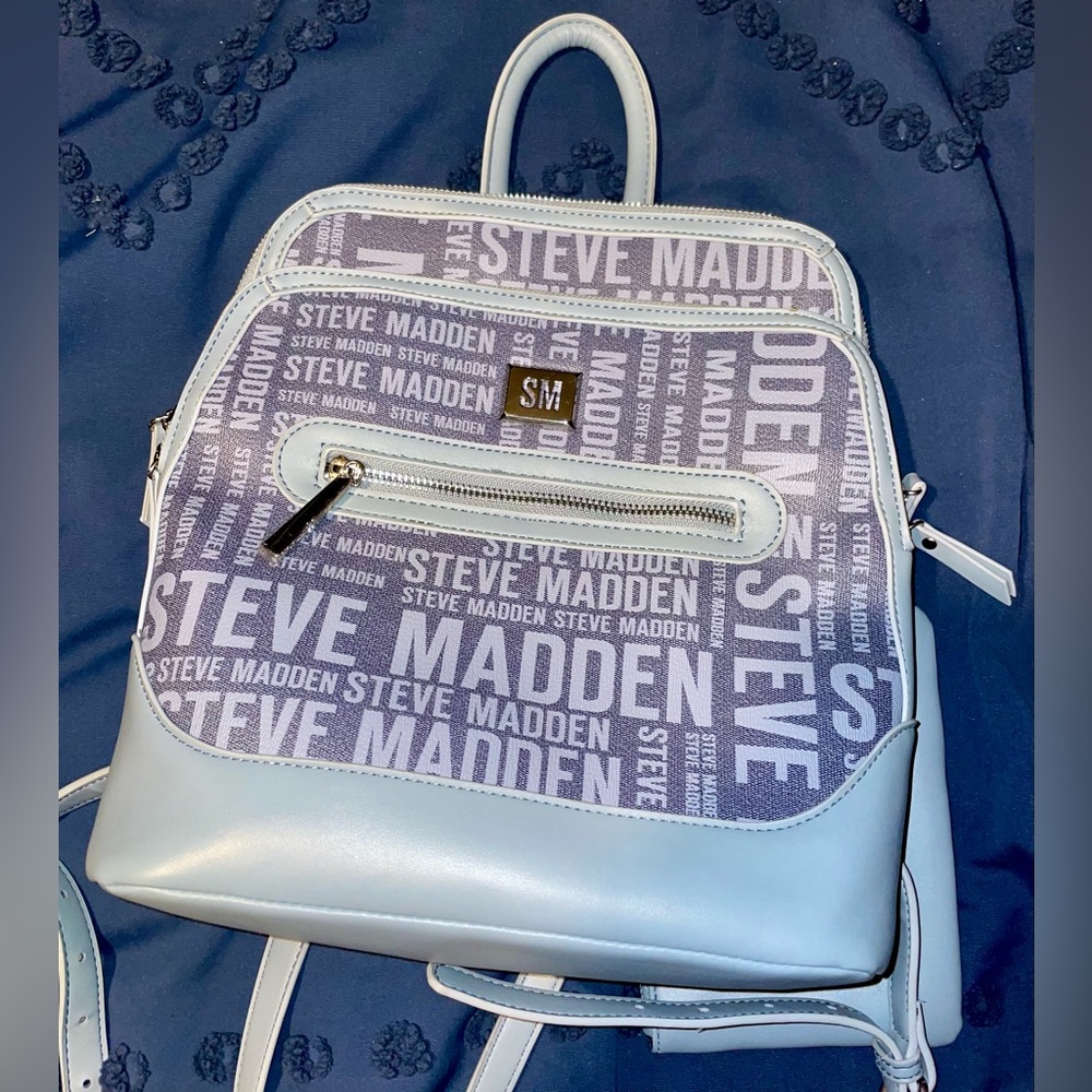 Steve Madden mini backpack/tote purse. Sleek design but holds a lot.